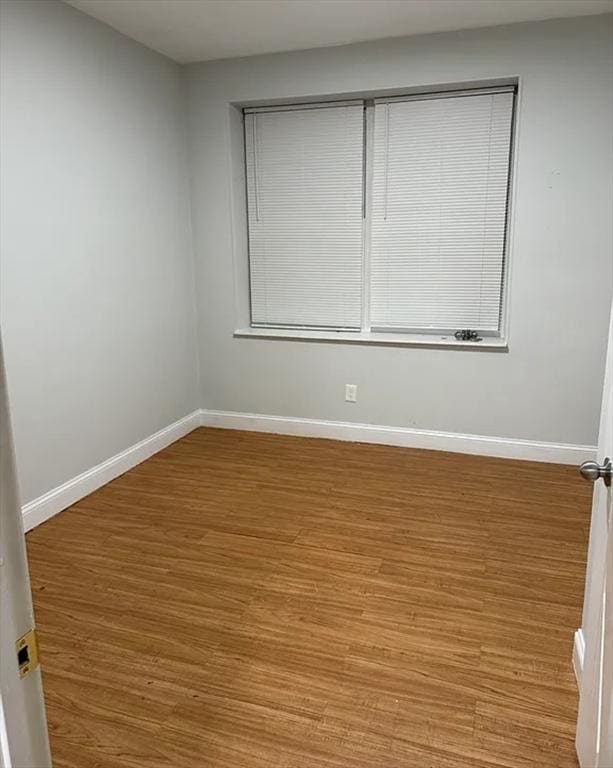 7 Esmond St, Boston, MA 02121 - unfurnished room with baseboards and wood finished floors