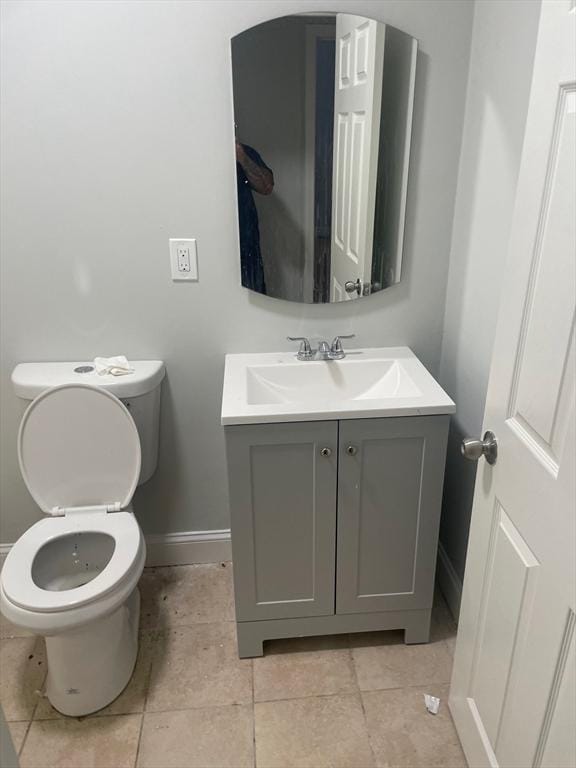 7 Esmond St, Boston, MA 02121 - bathroom with toilet, vanity, tile patterned flooring, and baseboards