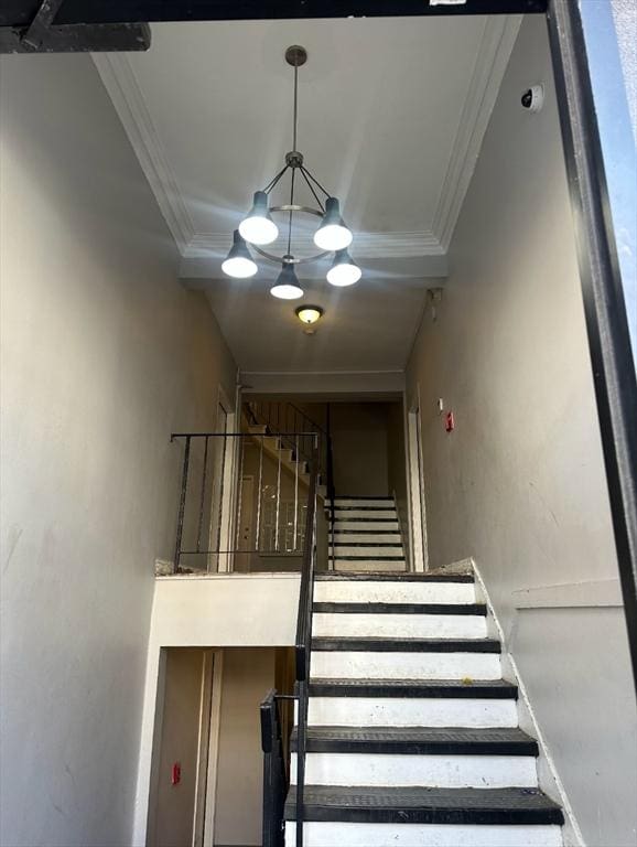 7 Esmond St, Boston, MA 02121 - staircase with a chandelier and crown molding