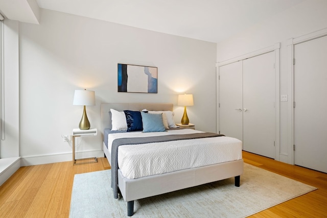 bedroom featuring light wood-type flooring