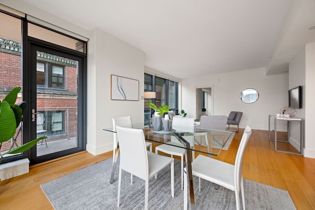 dining space featuring light hardwood / wood-style flooring