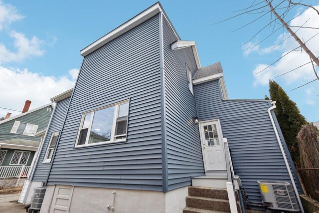 view of front of house with central AC unit