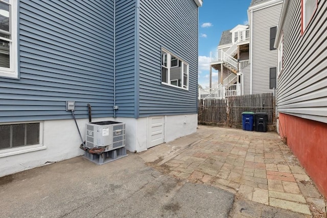 view of patio featuring fence