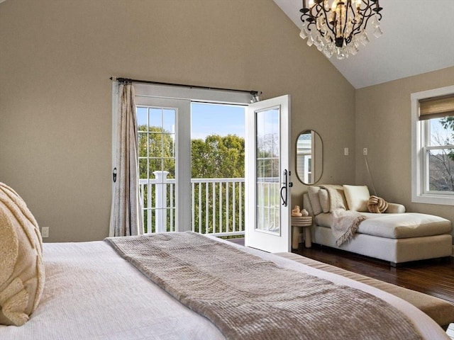 83 Altamont Ave, Melrose, MA 02176 - bedroom featuring an inviting chandelier, wood finished floors, high vaulted ceiling, and access to exterior