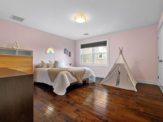 83 Altamont Ave, Melrose, MA 02176 - bedroom with baseboards, visible vents, and hardwood / wood-style flooring