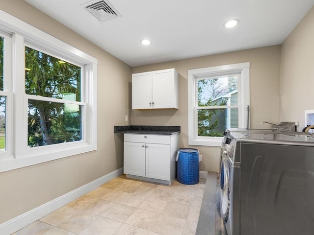 83 Altamont Ave, Melrose, MA 02176 - laundry room with washing machine and dryer, cabinet space, visible vents, baseboards, and recessed lighting