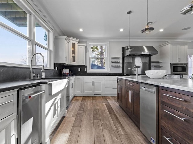 83 Altamont Ave, Melrose, MA 02176 - kitchen with stainless steel appliances, wood finished floors, recessed lighting, white cabinetry, and dark brown cabinets