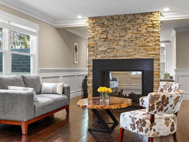 83 Altamont Ave, Melrose, MA 02176 - living area featuring wainscoting, ornamental molding, wood-type flooring, and a decorative wall