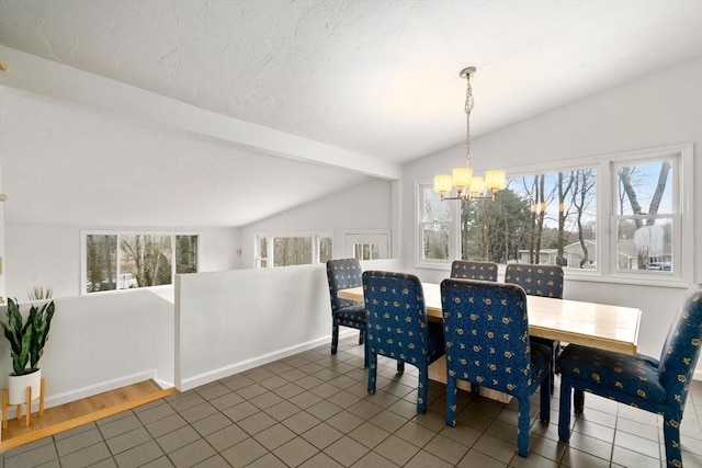 tiled dining area with a chandelier, lofted ceiling with beams, and baseboards