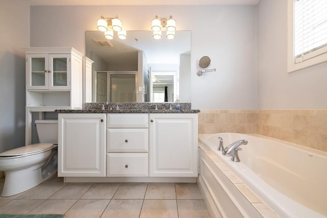 full bathroom with double vanity, a bath, tile patterned floors, a shower stall, and a sink