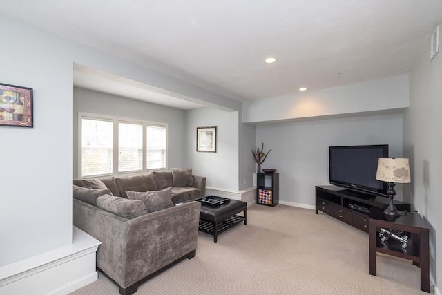 living room with light carpet, baseboards, and recessed lighting