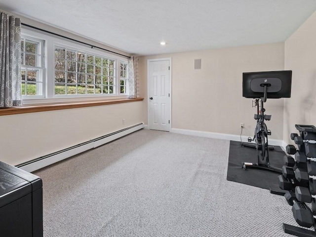 exercise room with recessed lighting, baseboard heating, carpet floors, and baseboards