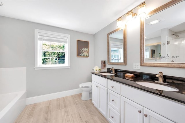 5 Allen St Unit 5, Woburn, MA 01801 - full bathroom featuring double vanity, a garden tub, and a shower