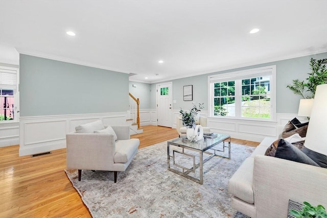 5 Allen St Unit 5, Woburn, MA 01801 - living area with stairway, crown molding, recessed lighting, wainscoting, and light wood finished floors