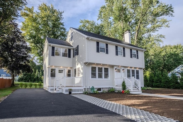 colonial home with a chimney