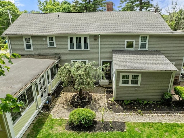40 Washington St, Hanover, MA 02339 - rear view of house with a chimney and roof with shingles