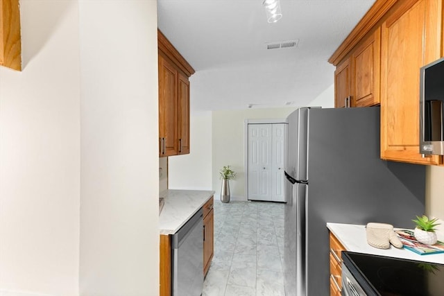 kitchen featuring stainless steel dishwasher