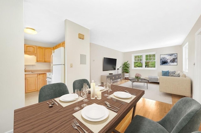 108 Emerson Gardens Rd Unit 108, Lexington, MA 02420 - dining space featuring light wood finished floors