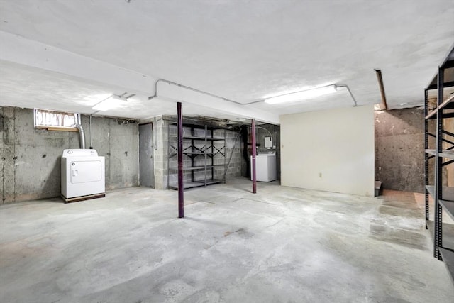 108 Emerson Gardens Rd Unit 108, Lexington, MA 02420 - below grade area featuring washer / dryer
