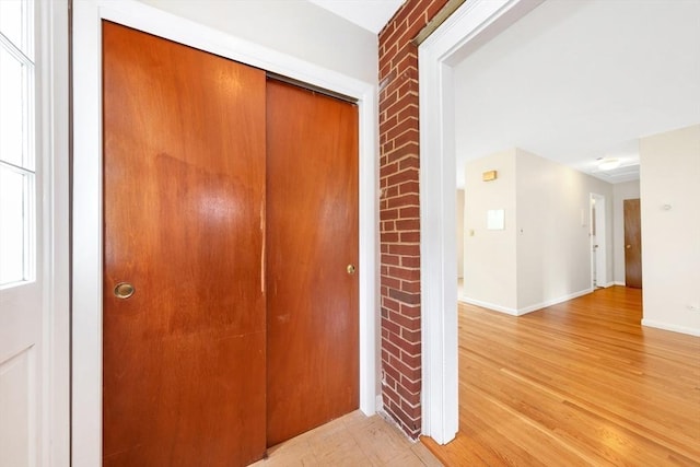 108 Emerson Gardens Rd Unit 108, Lexington, MA 02420 - hall with light wood finished floors and baseboards
