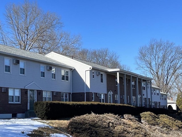 view of front of property with brick siding