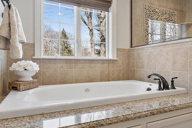 full bathroom with a garden tub