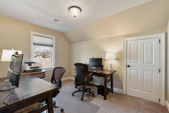 home office featuring vaulted ceiling, carpet, visible vents, and baseboards