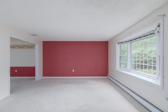 40 Langley Ln, Tewksbury, MA 01876 - empty room with an accent wall, a baseboard heating unit, wallpapered walls, carpet, and baseboards