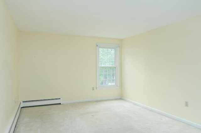 40 Langley Ln, Tewksbury, MA 01876 - empty room with a baseboard heating unit, baseboards, and light colored carpet