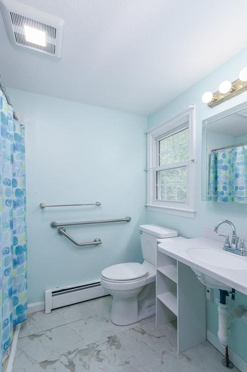 40 Langley Ln, Tewksbury, MA 01876 - full bathroom featuring a baseboard radiator, marble look tiles, toilet, and a sink
