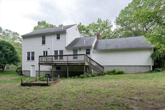 40 Langley Ln, Tewksbury, MA 01876 - back of house featuring a wooden deck, a lawn, a chimney, and stairs