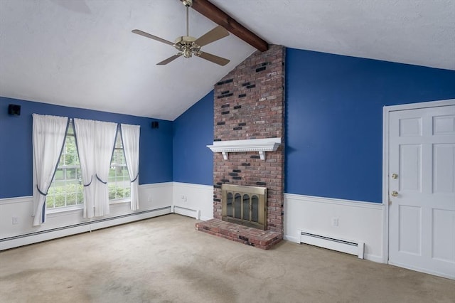 40 Langley Ln, Tewksbury, MA 01876 - unfurnished living room with baseboard heating, a ceiling fan, wainscoting, carpet floors, and a fireplace