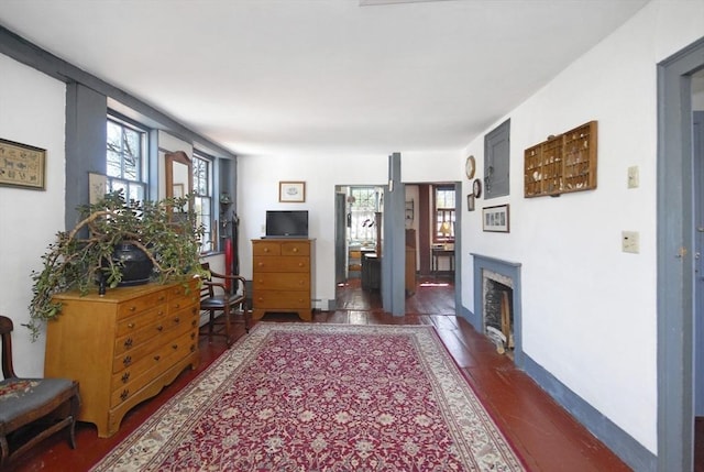 corridor featuring baseboards