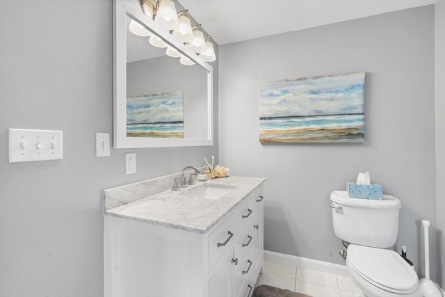 half bath featuring toilet, tile patterned flooring, baseboards, and vanity