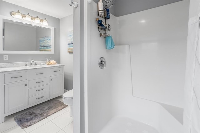 full bath featuring a shower, vanity, toilet, and tile patterned floors