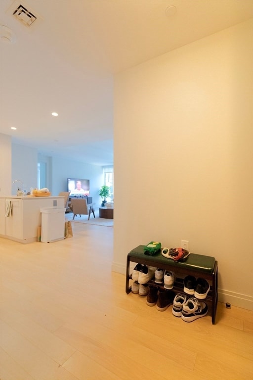 hall featuring hardwood / wood-style floors