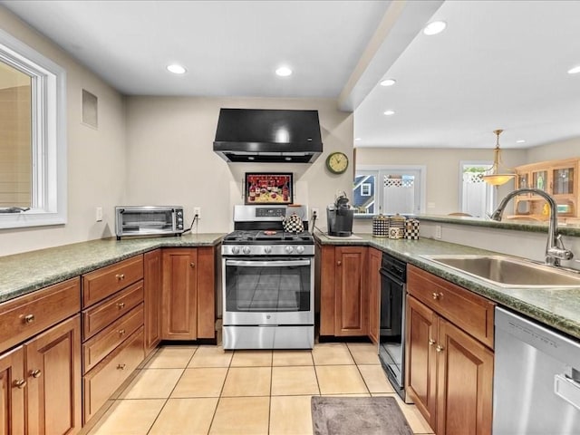 55 Dwight St, Dedham, MA 02026 - kitchen with stainless steel appliances, range hood, a sink, recessed lighting, and brown cabinetry