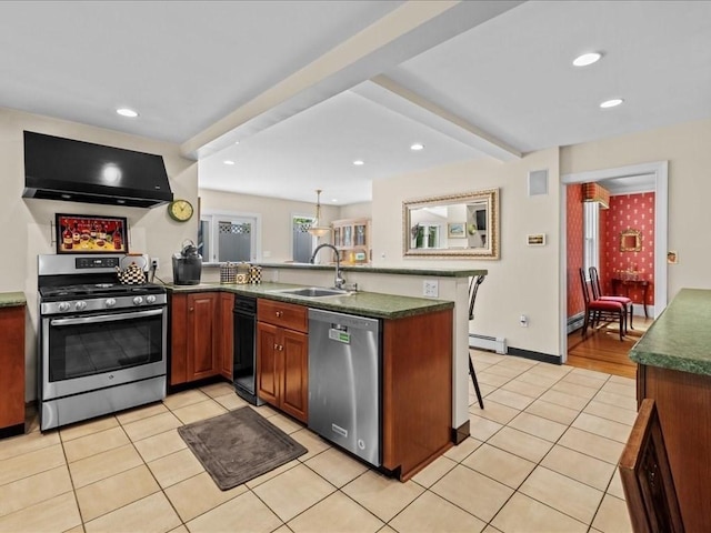 55 Dwight St, Dedham, MA 02026 - kitchen featuring appliances with stainless steel finishes, a sink, exhaust hood, a peninsula, and a baseboard heating unit