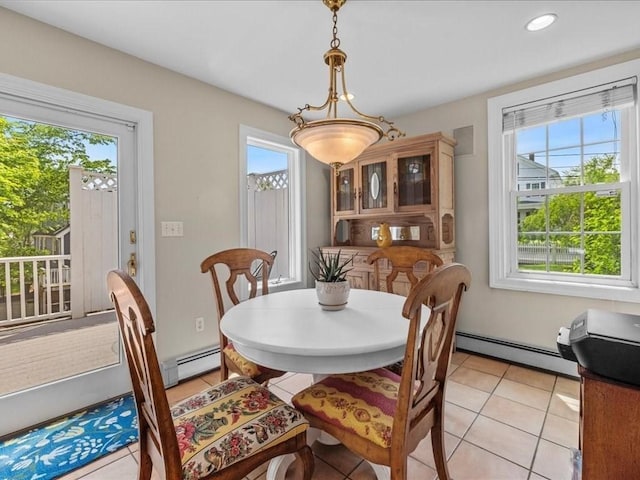 55 Dwight St, Dedham, MA 02026 - dining space featuring plenty of natural light, baseboard heating, light tile patterned floors, and recessed lighting