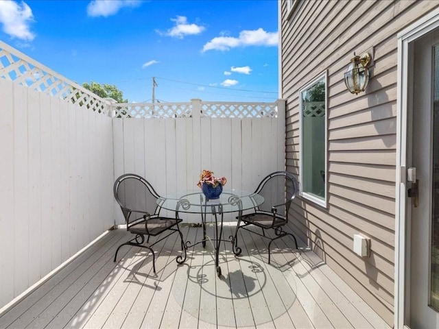 55 Dwight St, Dedham, MA 02026 - wooden terrace with outdoor dining area