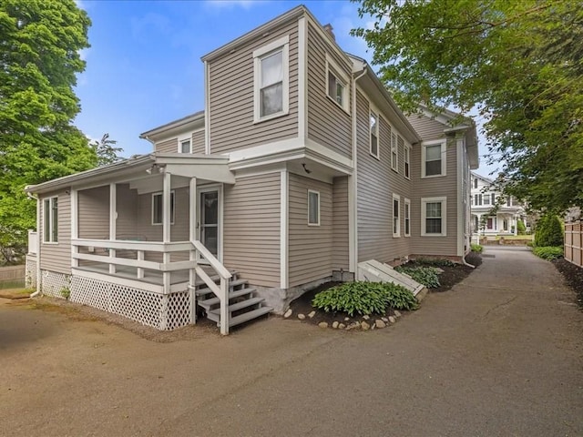 55 Dwight St, Dedham, MA 02026 - view of property exterior featuring a porch
