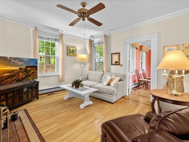 55 Dwight St, Dedham, MA 02026 - living area with a ceiling fan, crown molding, wood finished floors, and a baseboard radiator