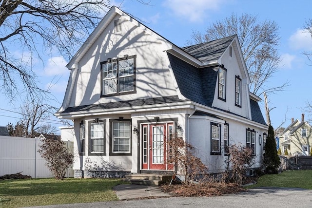 view of front of home featuring a front lawn