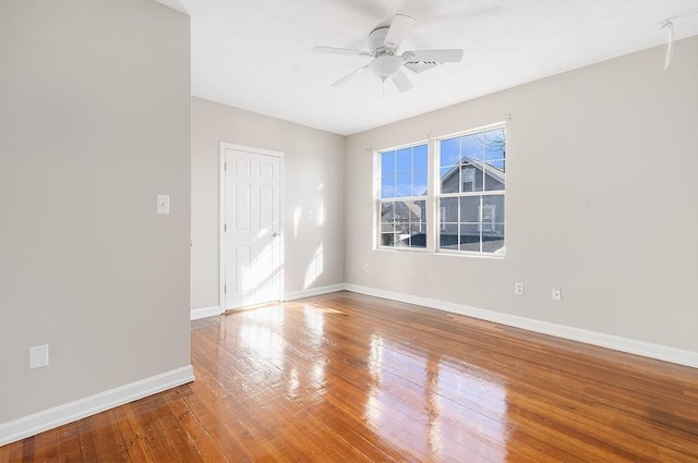 unfurnished room featuring wood-type flooring and ceiling fan