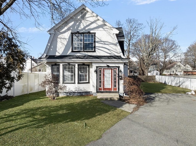 view of front of home with a front lawn