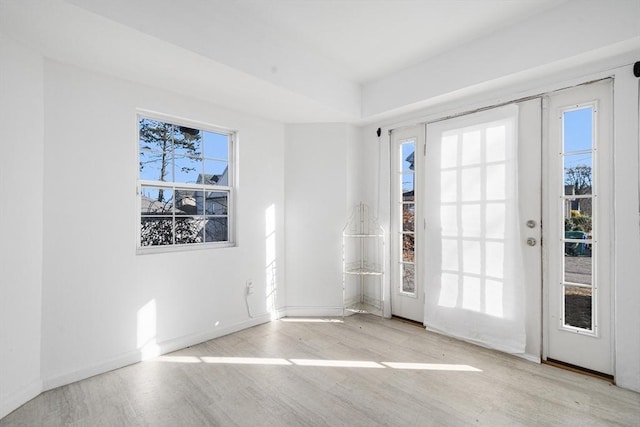 unfurnished room featuring light hardwood / wood-style flooring