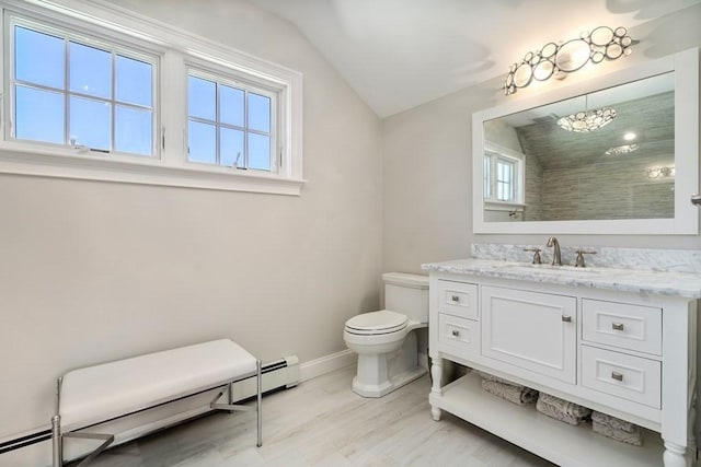 619 Main St, Hanover, MA 02339 - bathroom featuring baseboard heating, lofted ceiling, toilet, a chandelier, and baseboards