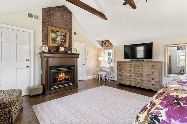 619 Main St, Hanover, MA 02339 - bedroom with vaulted ceiling, wood finished floors, a large fireplace, ceiling fan, and baseboards