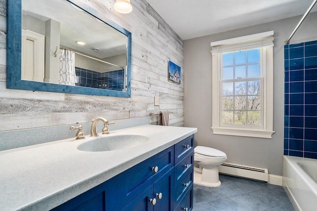619 Main St, Hanover, MA 02339 - bathroom featuring a baseboard heating unit, wood walls, plenty of natural light, vanity, and toilet
