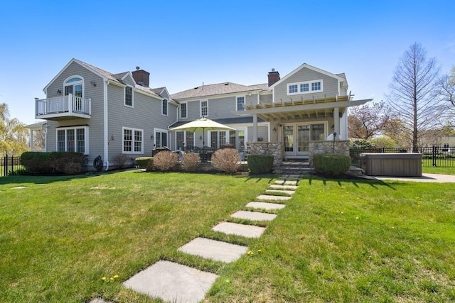 619 Main St, Hanover, MA 02339 - rear view of house featuring french doors, a hot tub, and a balcony